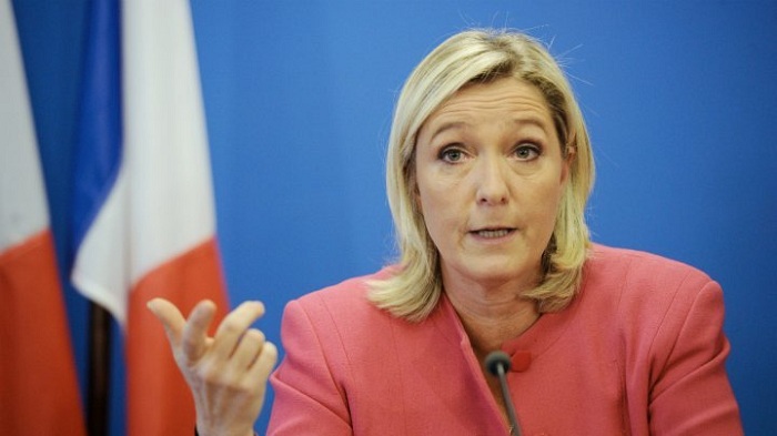 Le Pen demands removal of EU flag for TV interview